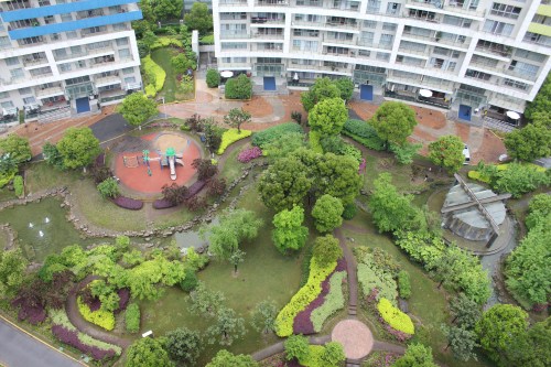 Looking down to the playground and green space Looking down to the playground and green space