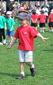 First sports activity - balance the hoop on your head