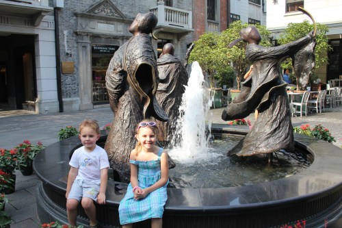 Kids by a fountain in Xintiandi