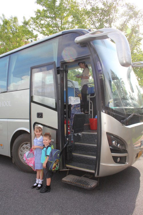 Ready to board the school bus on the first day of school Ready to board the school bus on the first day of school
