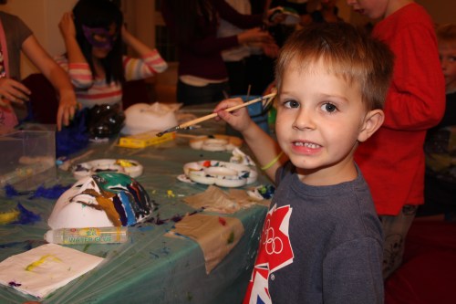 Oliver creating his masterpiece mask