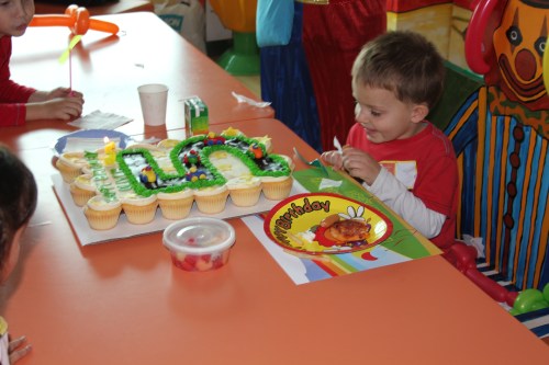 Blowing out his "5" candle