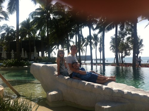 Lazing on the alligator in the Club pool.