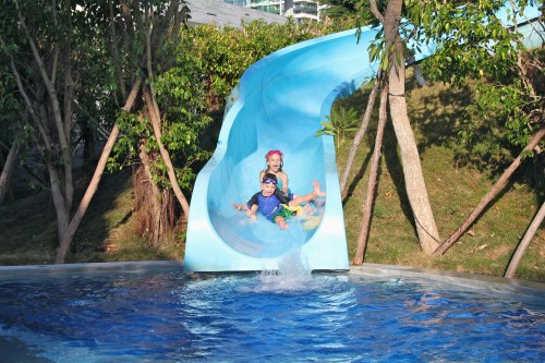 The water slide at the family pool.