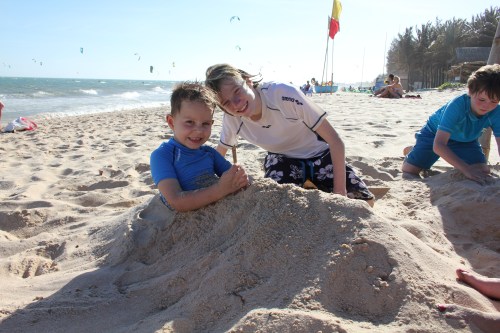 Dan buried Oliver up to his neck!  And, he loved it!