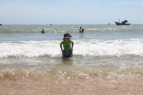 "I am getting the sand out of my swim shorts!"