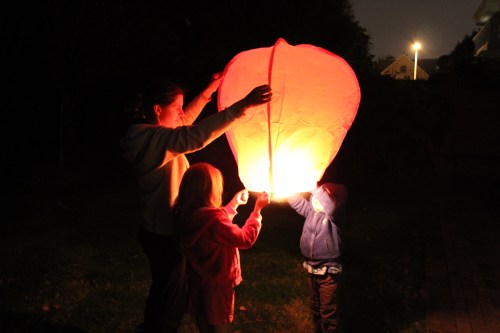 Lighting the lantern - it took several minutes to fill with warm air.