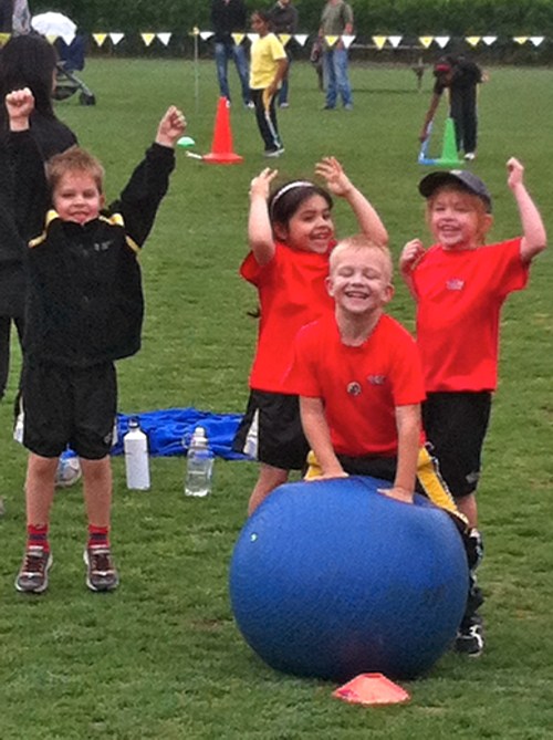 The Dragons team here have just found out that they won the last round which was bean bags in the hoop!