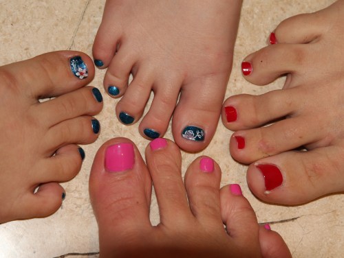 Nails, nails, nails.  Isabelle (Flower) and Ava (Rose), Emma (Red) and Sara (Pink)