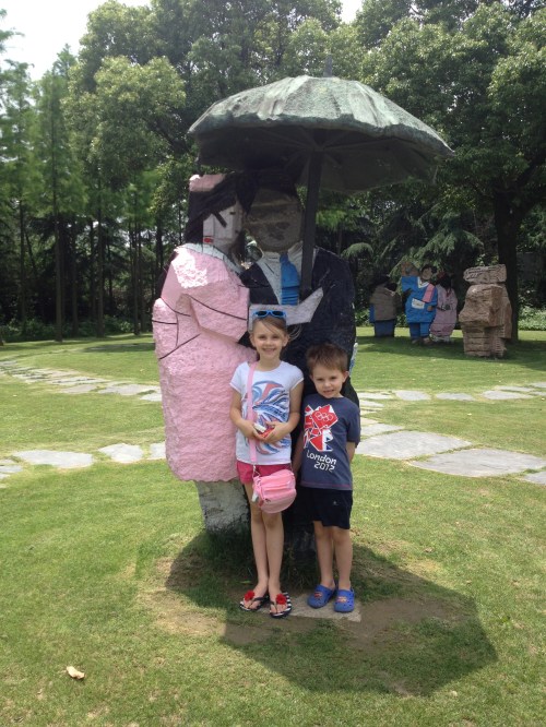 Clever rock formations - into a village of people.  The 2 in front are real!!