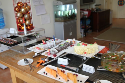 Desserts - mini Christmas Puddings, fruit tarts, stollen, chocolate mousse log and fruit.  YUMMY!