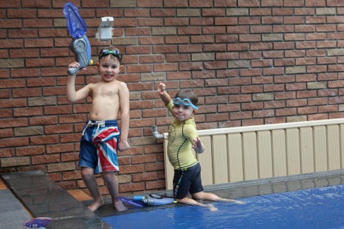Oliver and Joseph firing off the water pistols!