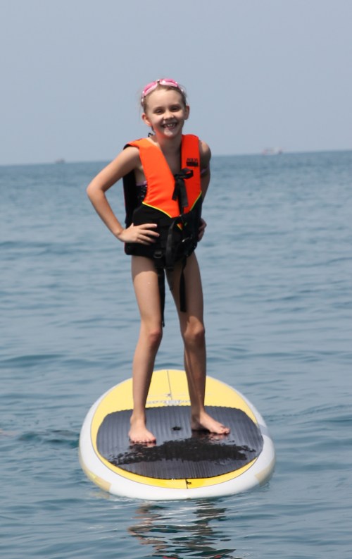 Isabelle standing up on the Paddle Board.  Did not last long!!