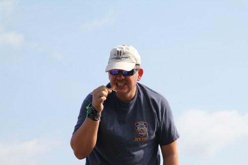 Owen pretending to eat a dead crab that he found in the rock pools.