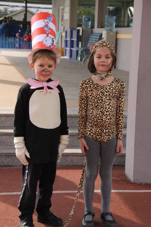 Oliver - winner of the Boys Best Costume posing with his girlie counterpart!  Glad to see he is smiling this time.  Photo is courtesy of BISS.
