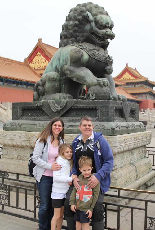 All of us by one of the many stone Lions guarding the Palace.
