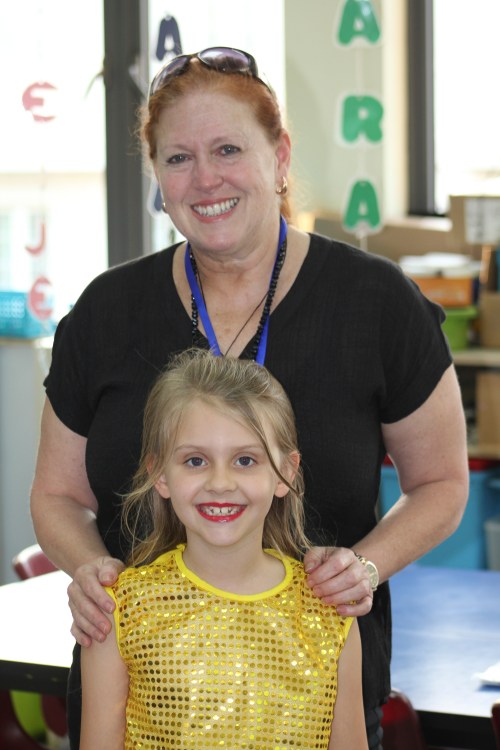 Isabelle and her teacher, Mrs Suzanne Sinclair.  This was drop off time prior to curtain up!